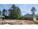 Close up view of wooden frame and ground work laid for residential foundation at 800 Stone Pine Ct., Loris, SC 29569