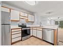 Well-equipped kitchen featuring modern stainless steel appliances and ample counter space at 820 Fairway Dr. # 1502Hh, Longs, SC 29568