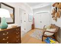 Bright foyer with a hat display, decor, and a glimpse of a door to another area at 95 Sanderling Ave., Georgetown, SC 29440