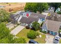 Lovely aerial view of home showcasing manicured lawn and proximity to neighborhood amenities at 9580 Kings Rd., Myrtle Beach, SC 29572