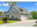 Lovely home with a spacious driveway leading to a convenient two-car garage at 1051 Academy Dr., Conway, SC 29526