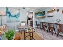 Well-decorated living area with dining space and a flatscreen TV displaying beach views at 201 74Th Ave N Ocean Blvd. # 2627, Myrtle Beach, SC 29572