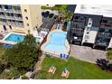 Aerial view of condo with swimming pool, sundeck, picnic area, and easy access to the beach at 201 76Th Ave. N # D-3, Myrtle Beach, SC 29572