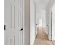 Bright hallway with ceramic tile flooring and white doors at 2061 Silvercrest Dr. # 7E, Myrtle Beach, SC 29579