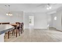Spacious open-concept living area with neutral tile flooring and natural lighting at 2061 Silvercrest Dr. # 7E, Myrtle Beach, SC 29579