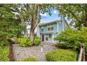 Charming two-story home features mature trees, well-maintained landscaping, and an inviting atmosphere at 308 76Th Ave. N # 5, Myrtle Beach, SC 29572