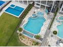 Aerial view of the in-ground pool and jacuzzi with ample room for entertaining friends and Gathering at 433 Saint Julian Ln., Myrtle Beach, SC 29579