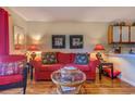 Cozy living room with elegant decor, a comfortable red sofa, and stylish accent pieces at 510 Fairwood Lakes Dr. # 15-I, Myrtle Beach, SC 29588