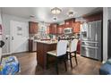 Spacious kitchen with stainless steel appliances, granite countertops, and an island with seating at 1300 Ragin St., Myrtle Beach, SC 29577