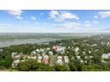 Stunning aerial view of a charming neighborhood with beautiful houses nestled among lush greenery and waterways at 17 Trigger Fish Ln., Murrells Inlet, SC 29576
