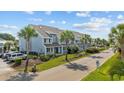 Beautiful condos accented by palm trees, offering a desirable location with a well-maintained community at 1890 Colony Dr. # 17L, Surfside Beach, SC 29575