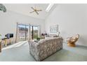 Inviting living area featuring vaulted ceilings, ample natural light, and a relaxing atmosphere at 1890 Colony Dr. # 17L, Surfside Beach, SC 29575