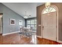 Dining room with natural light, hardwood floors, and views of the entryway at 303 Ayrie Ct., Conway, SC 29527