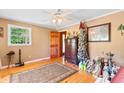 Bright bedroom with wooden floors and a window showcasing the outdoor view at 308 Old Stage Rd., Mullins, SC 29574