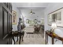 Bright and spacious foyer with tile floors, elegant decor, and views into the living spaces at 341 Bahama Dr., Murrells Inlet, SC 29576