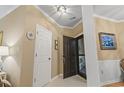 Inviting entryway with neutral walls, and a decorative ceiling light fixture at 405 Pipers Ln. # 405, Myrtle Beach, SC 29575
