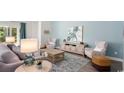 Comfortable living room with stylish furniture, decor, and a calming color palette at 737 Doonbeg Ct., Conway, SC 29526