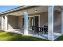 Covered patio with outdoor seating, perfect for entertaining or enjoying the outdoors at 737 Doonbeg Ct., Conway, SC 29526