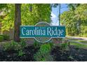 Carolina Ridge neighborhood entrance sign surrounded by lush landscaping and greenery at 830 44Th Ave. N # T3, Myrtle Beach, SC 29577
