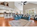 Inviting living room with high ceilings, hardwood floors, and open concept layout at 904 Moultrie Circle, Myrtle Beach, SC 29588
