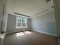 Bright bedroom featuring natural light, recessed lighting and a trey ceiling at 1005 Lady Bird Way, North Myrtle Beach, SC 29582