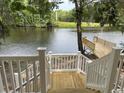 Scenic waterfront view from the house featuring a private dock perfect for relaxation at 1022 Waccamaw Dr., Conway, SC 29526