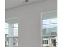 Bright, sun-drenched room with lots of natural light and large grid windows overlooking the neighborhood at 1092 Laconic Dr., Myrtle Beach, SC 29588