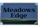 A Meadows Edge community sign with attractive lettering and inviting graphics at 1096 Oak Meadow Dr., Conway, SC 29526