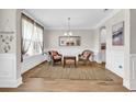 Bright living area with hardwood floors, neutral walls, and classic decor, offering comfortable seating at 1662 Westminster Dr., Myrtle Beach, SC 29577
