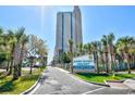 Sand Dunes Resort entrance sign with villas, suites, and condos text at 201 74Th Ave. N # 707, Myrtle Beach, SC 29572