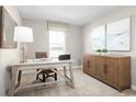 Bright and functional home office space featuring a clean desk, ample storage, and calming decor, ideal for productivity at 2075 Nw Parow Ln Nw # F, Calabash, NC 28467