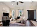 Cozy living room featuring a comfortable sofa, stylish decor, and hardwood floors at 2080 Highway 915, Loris, SC 29569