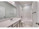 Bright bathroom featuring a large mirror, tub and shower combination, and tile floors at 262 Dunlin Pl, Conway, SC 29526