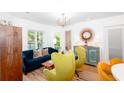 Bright living room with hardwood floors, unique seating, and stylish decor at 514 Blockade Dr., Pawleys Island, SC 29585