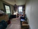 Uncluttered room featuring a vintage washer, built-in shelving and lots of storage and work space at 564 Baker Ave., Murrells Inlet, SC 29576