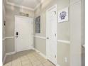 Bright entryway with neutral walls, tile flooring, and charming coastal decor at 6015 Catalina Dr. # 634, North Myrtle Beach, SC 29582
