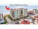 A corner oceanfront condo building with multiple levels of residential suites near the beach at 603 S Ocean Blvd. # 1504, North Myrtle Beach, SC 29582