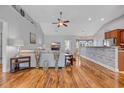 Bright living room with vaulted ceiling, hardwood floors, and stylish modern decor at 605 Fieldwoods Dr., Conway, SC 29526