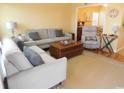 Inviting living room with neutral-toned sofas, stylish decor, and open access to other living areas at 620 Wave Rider Ln. # B10-1, North Myrtle Beach, SC 29582