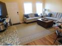 Cozy living area featuring two sofas, a decorative area rug, and an open doorway to the entry at 620 Wave Rider Ln. # B10-1, North Myrtle Beach, SC 29582