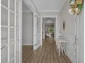 Inviting foyer with light gray walls and a view into the living area at 945 Waterbridge Blvd., Myrtle Beach, SC 29579