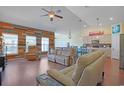 Open-concept living room with a blend of modern decor, hardwood floors, and natural light at 232 Angel Wing Dr., Myrtle Beach, SC 29588