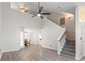 Spacious living room with an open layout, high ceilings, and hardwood floors at 1331 Bermuda Ct., Surfside Beach, SC 29575