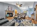 Inviting living room with a cozy fireplace and plush seating at 201 Surrey Ln., Myrtle Beach, SC 29579