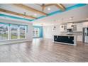 Spacious living room featuring wood-look floors, a ceiling fan, and an open concept at 294 Splendor Circle, Murrells Inlet, SC 29576