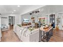 Bright and airy living room featuring a large sofa, stylish decor, and ample natural light at 3930 West Marion St., Mullins, SC 29574