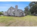 A condo with green backyard, with a fence and patio area, great for outdoor entertaining at 503 N 20Th Ave. N # 41D, North Myrtle Beach, SC 29582
