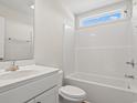 Clean and functional bathroom with a combined tub and shower and a white vanity sink at 651 Snowy Owl Way, Conway, SC 29527