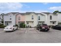 Charming townhomes with colorful exteriors and dedicated parking spaces for residents and visitors at 6703 Jefferson Pl. # G5, Myrtle Beach, SC 29572