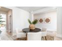 Neutral dining area with a round table and stylish decor at 7123 Shooting Star Way, Myrtle Beach, SC 29579